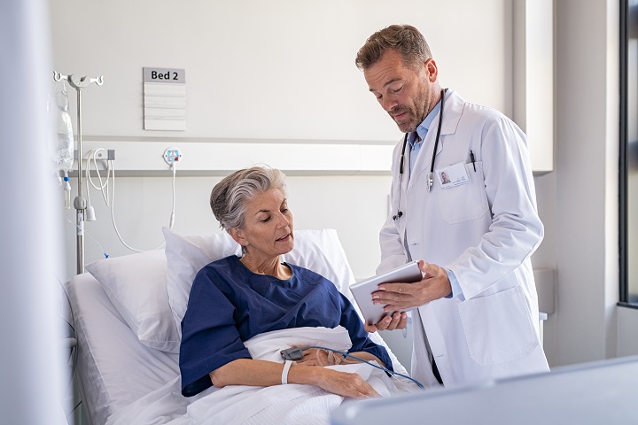 Doctor explaining to CKD patient the surgical procedure to create access for dialysis